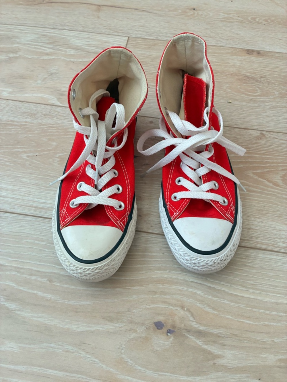 Red Converse All Star High Top Sneakers in Women's Size 6.  Men's Size 4